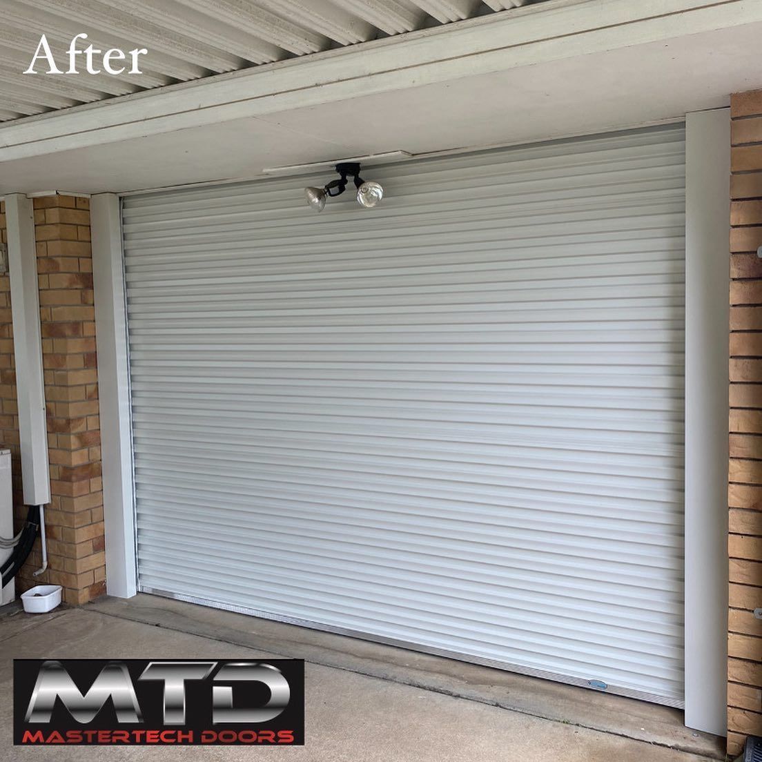 A picture of a garage door after being installed by mtd