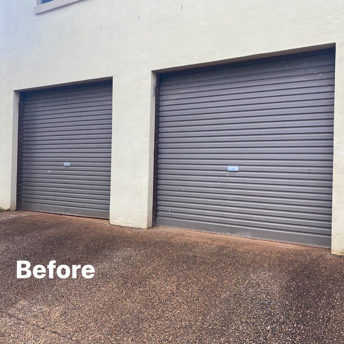 A picture of a garage door before being painted.
