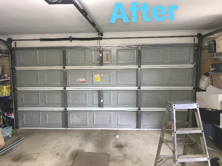 A picture of a garage door after being repaired.