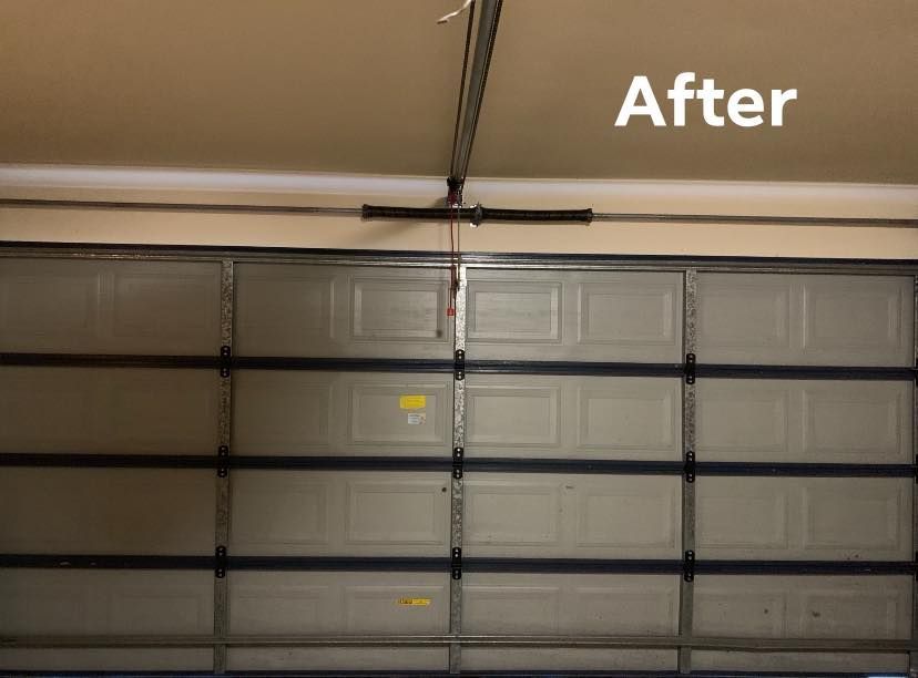 A picture of a garage door after being repaired