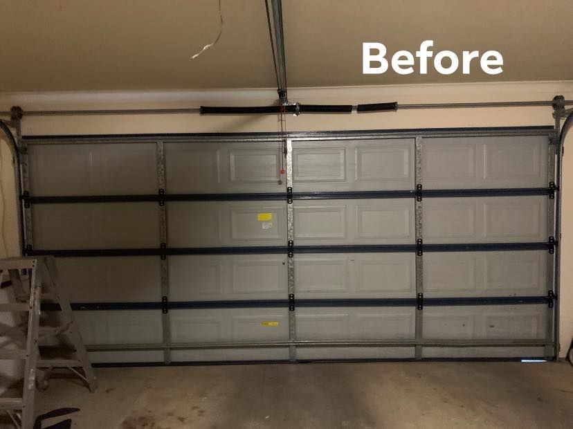 A picture of a garage door before being installed.