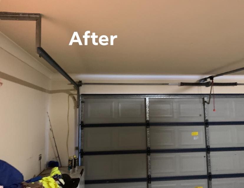 A picture of a garage door after being repaired