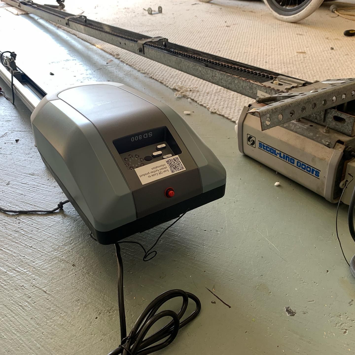 A garage door opener with the word mercury on it