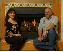 Owner In front Of The Fireplace — Canton, OH —  Ferguson's Fireside Chimney Cleaning & Repair