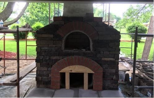 Outdoor Chimney Under Construction — Canton, OH —  Ferguson's Fireside Chimney Cleaning & Repair
