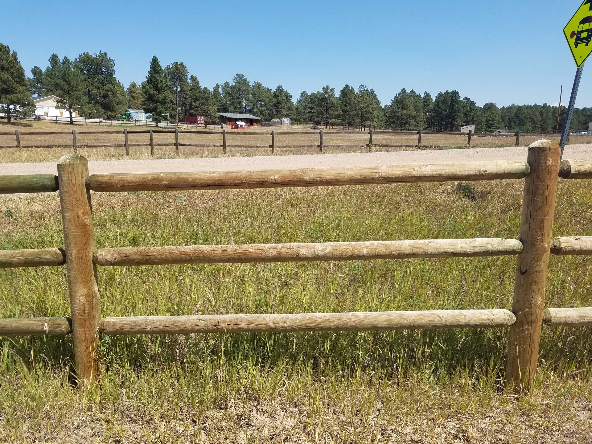 Secured White Fence — Elizabeth, CO — Estate Fence Supply