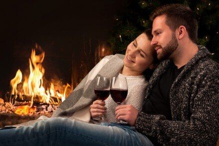 Couple having a wine - Fireplace in Lake George, NY
