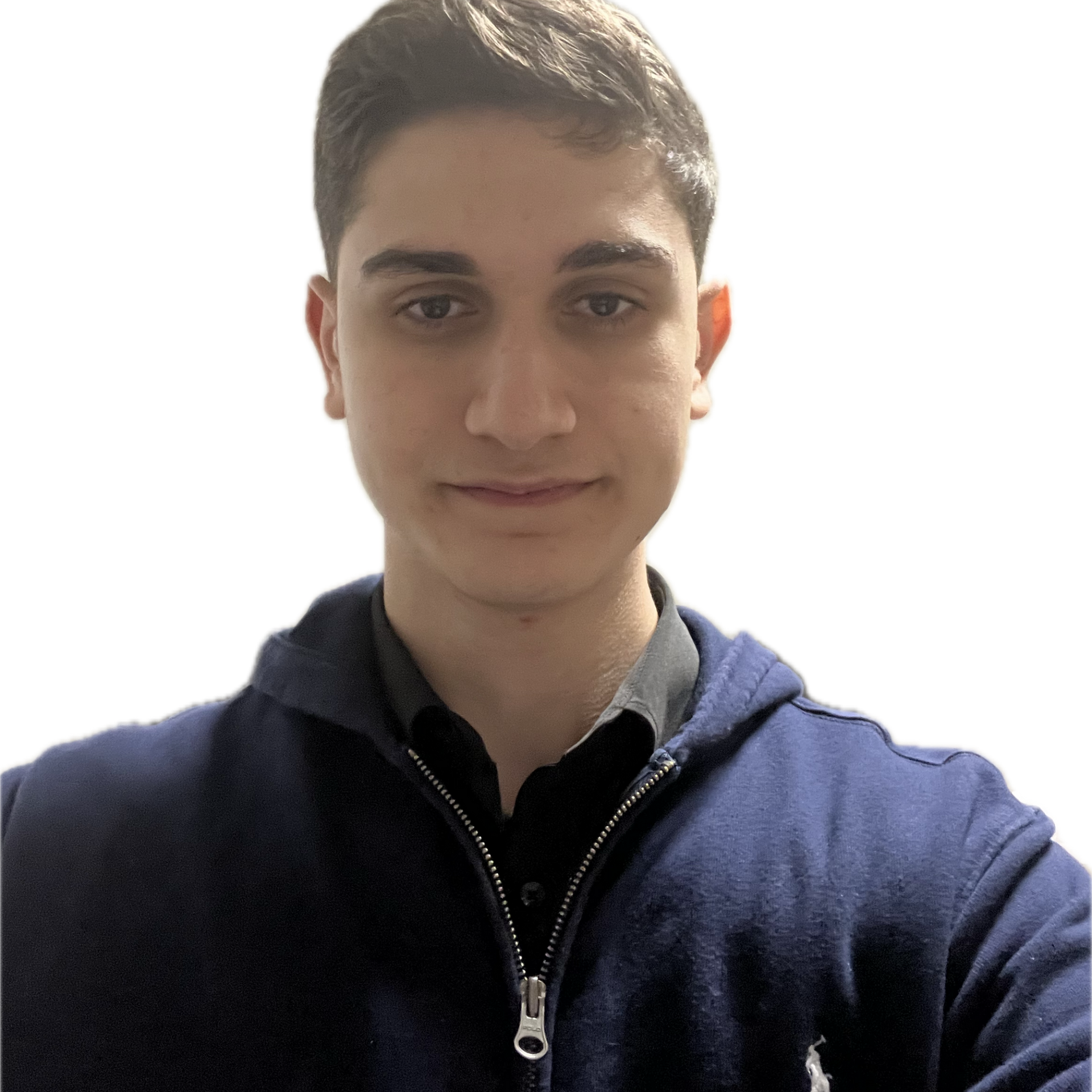 A man with a blue sweater is looking into the camera