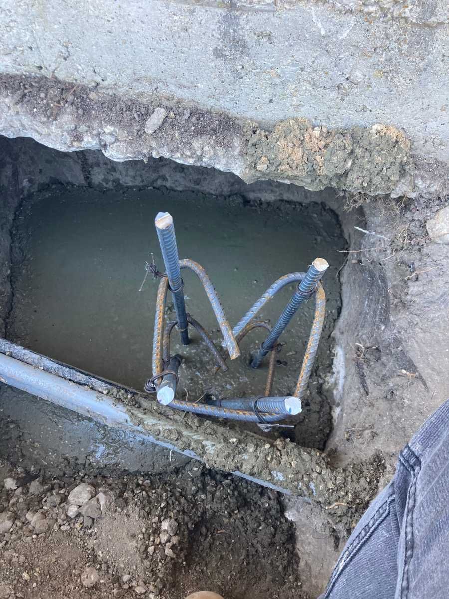 A person is digging a hole in the ground.