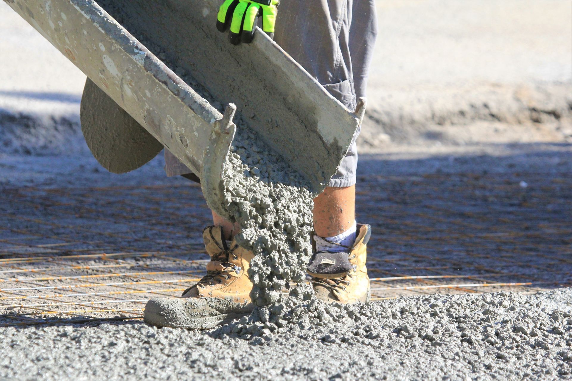 A person is pouring concrete 