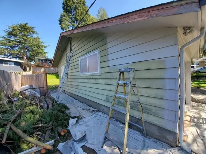 Neglected home exterior in Oregon showing signs of wear and damage before painting service