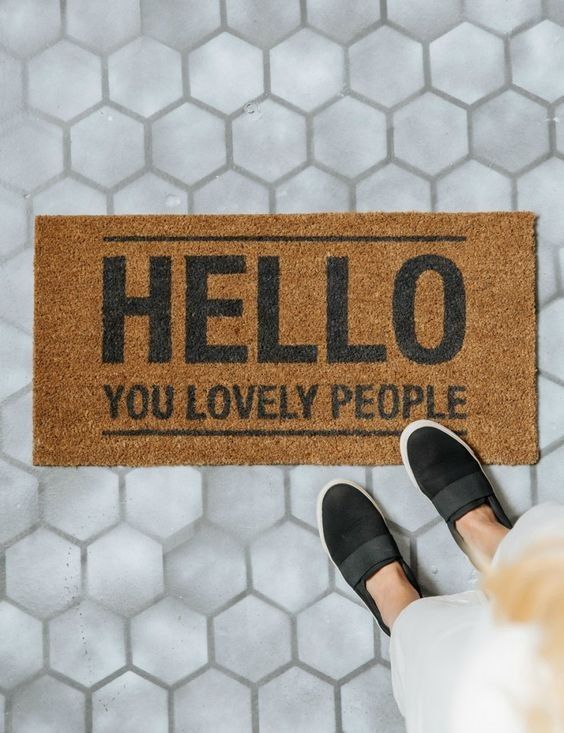 A door mat that says hello you lovely people