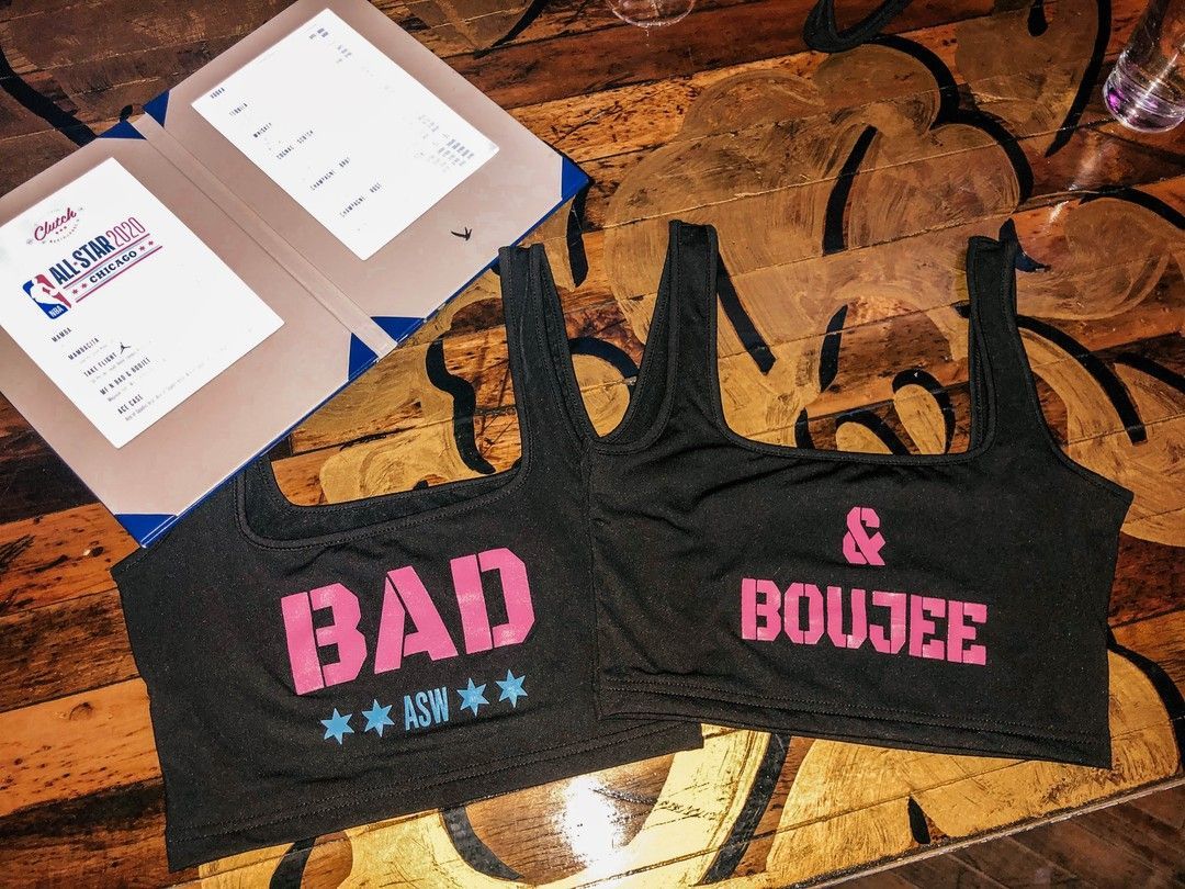 A black and white photo of a person wearing a shirt that says the apra brothers