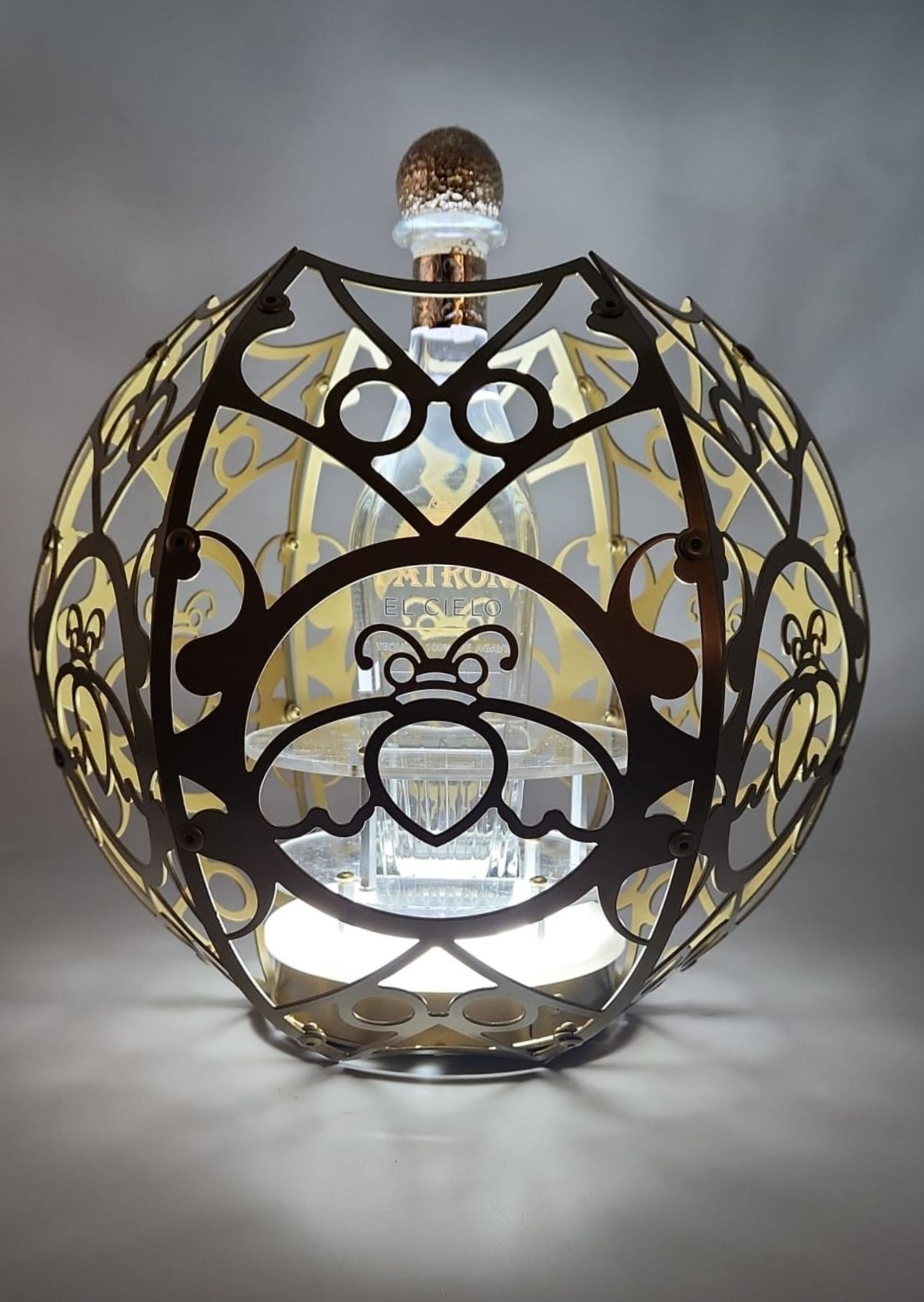 A black and yellow cap with the word capri on it