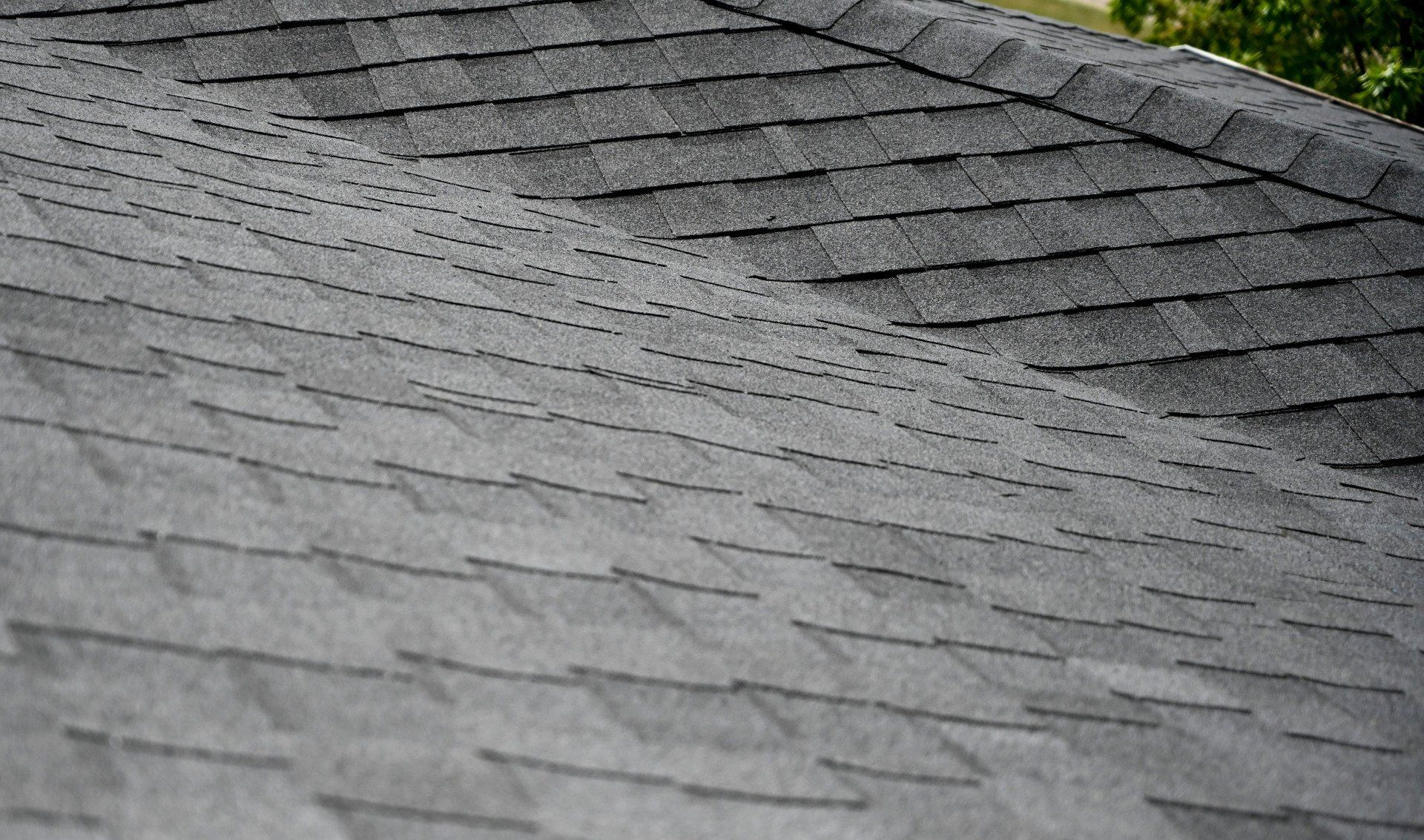 a close up of a roof with shingles on it