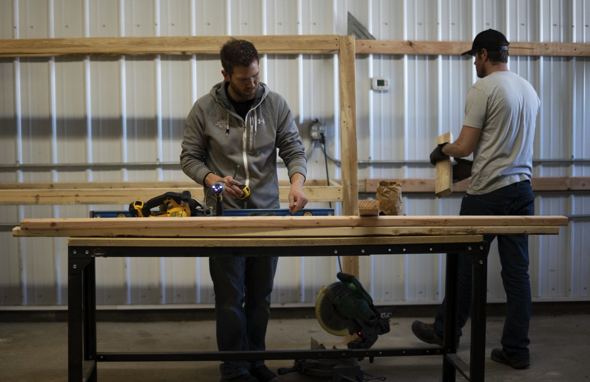 person working with table saw