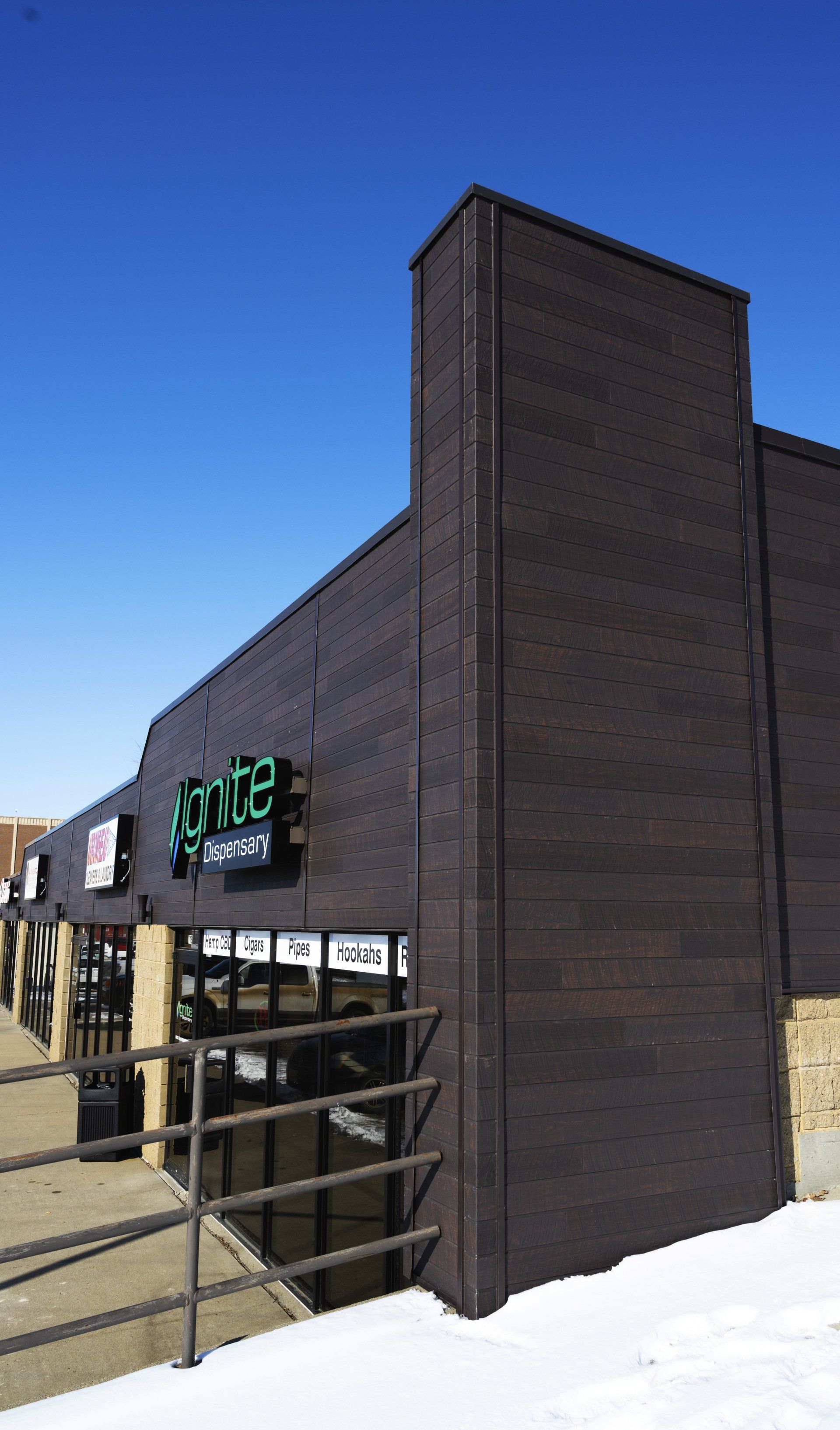 a large brick building with a sign on the side that says ' ignite '