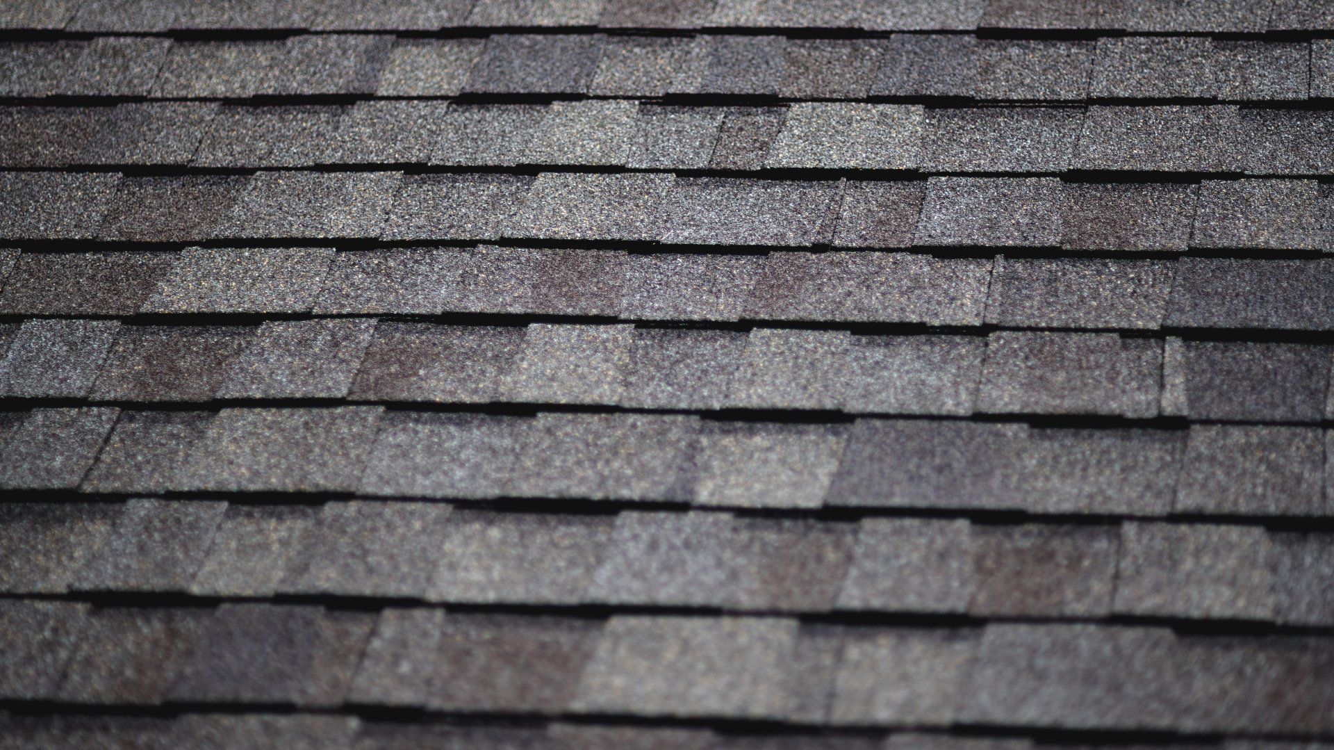 a close up of a roof with shingles on it