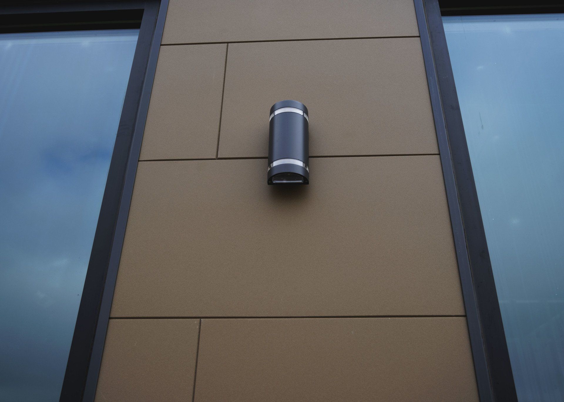 a building with a light on the side of it