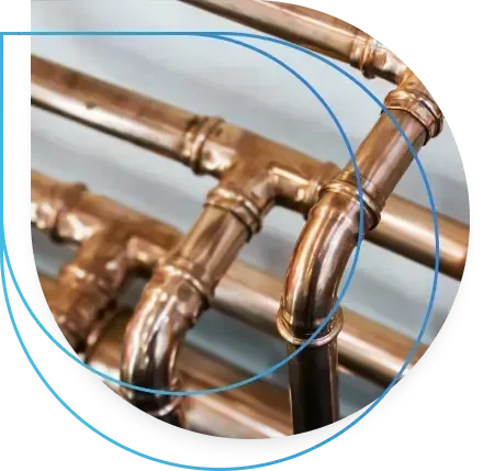 Copper pipes with joints and bends.