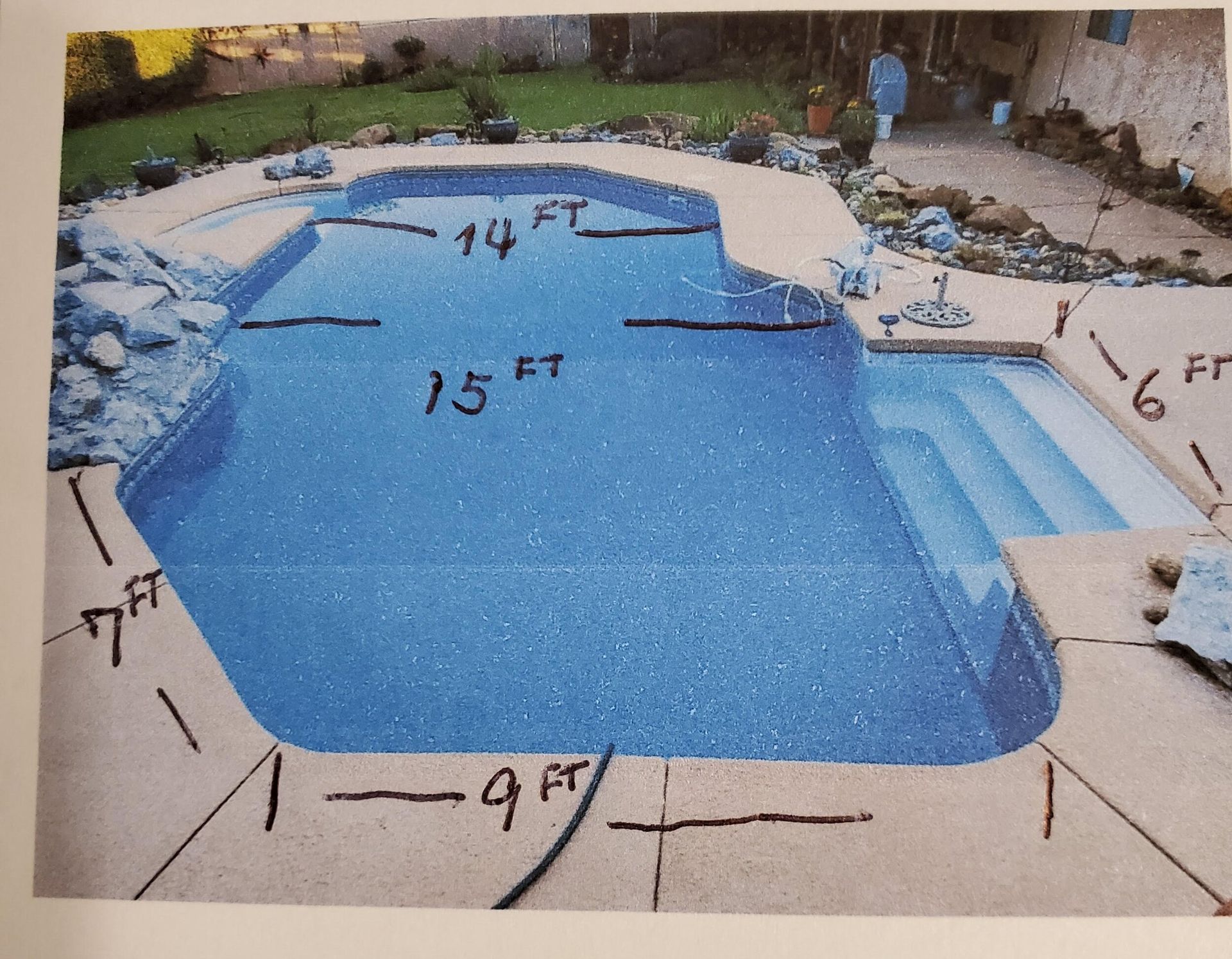 Swimming pool with measurements labeled.