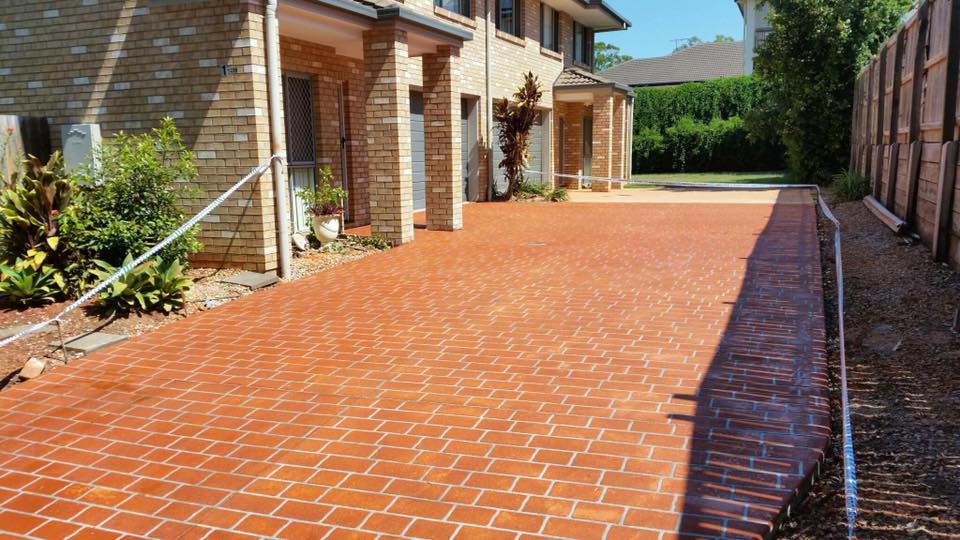 Family House With Concrete Driveway — Professional Concreting in Sunshine Coast, QLD