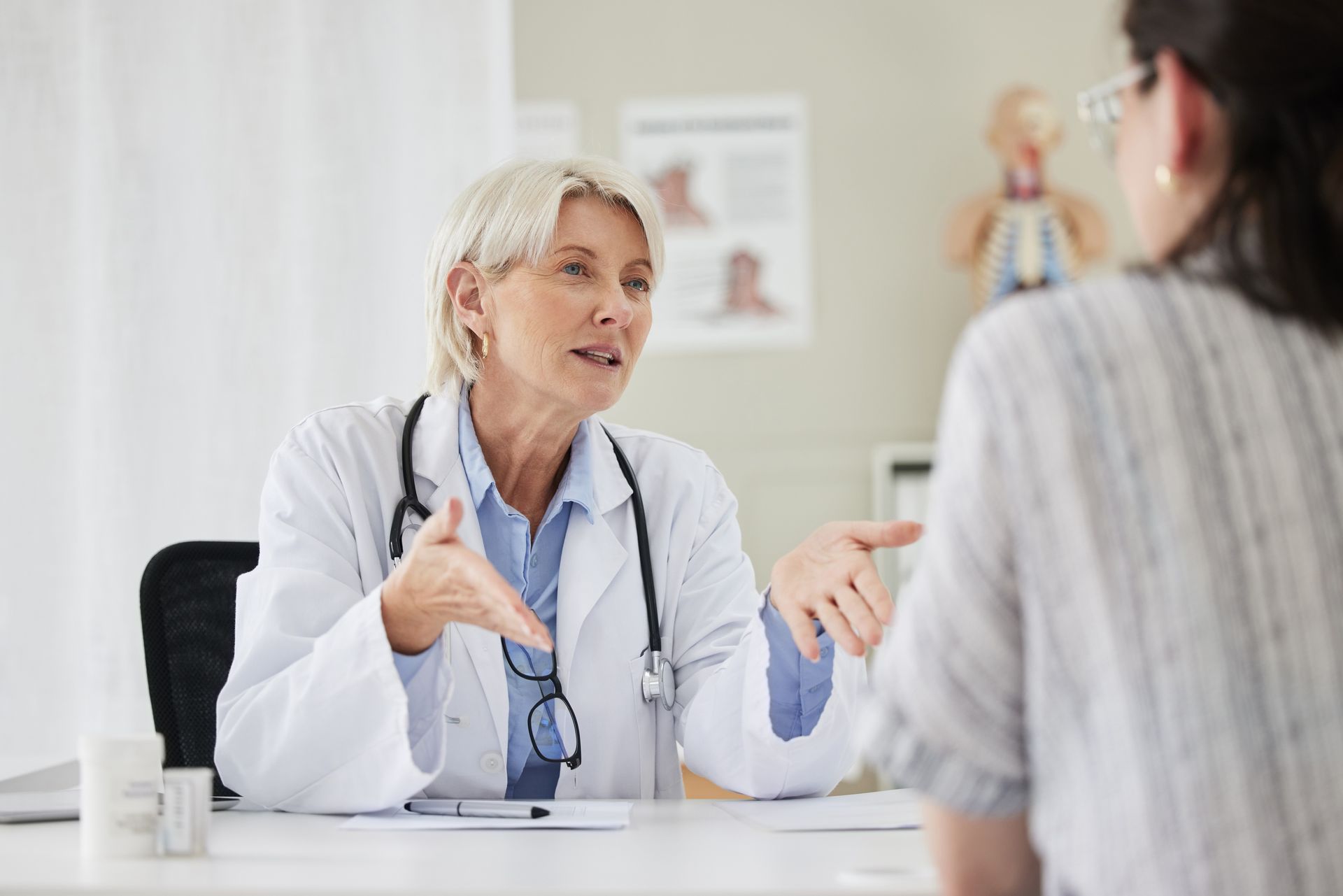 A doctor is talking to a patient.