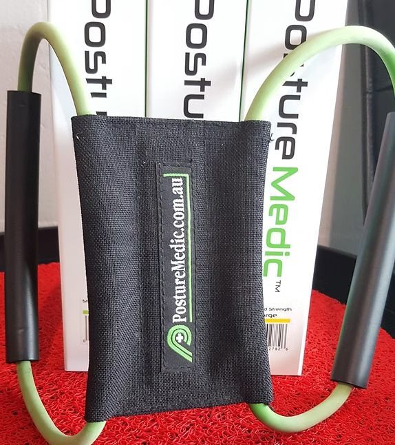 A Posture Medic Device is Sitting on a Red Mat — Anderson Family Chiropractic Health Centre in Mount Pleasant, QLD