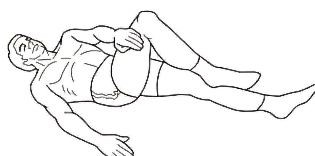 A Man Laying on His Back With His Legs Crossed — Anderson Family Chiropractic Health Centre in Mount Pleasant, QLD