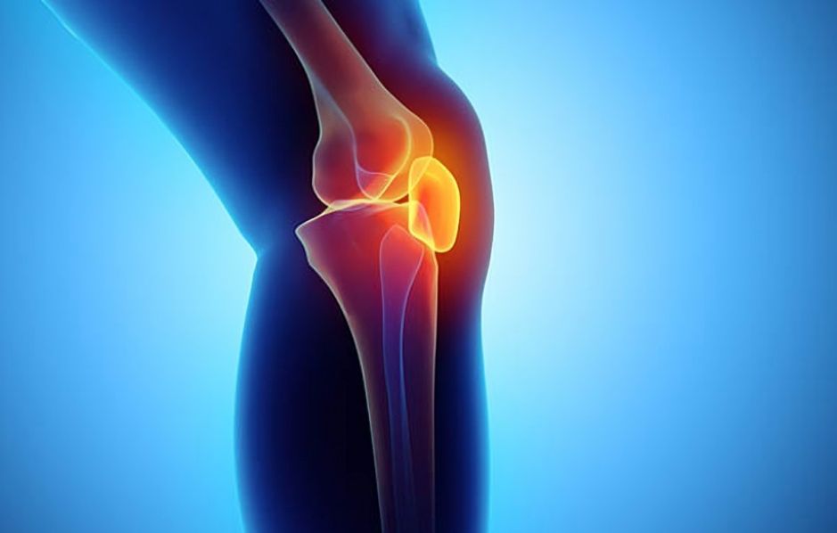 A Close Up of a Person 's Knee With a Red Knee Joint — Anderson Family Chiropractic Health Centre in Mount Pleasant, QLD