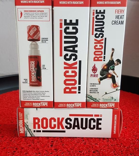 Three Boxes of Rocksauce Are Stacked on Top of Each Other — Anderson Family Chiropractic Health Centre in Mount Pleasant, QLD