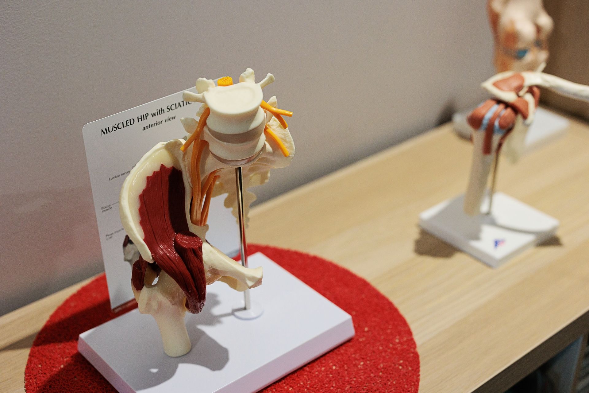 A Little Girl is Getting a Massage From a Doctor — Anderson Family Chiropractic Health Centre in Mount Pleasant, QLD