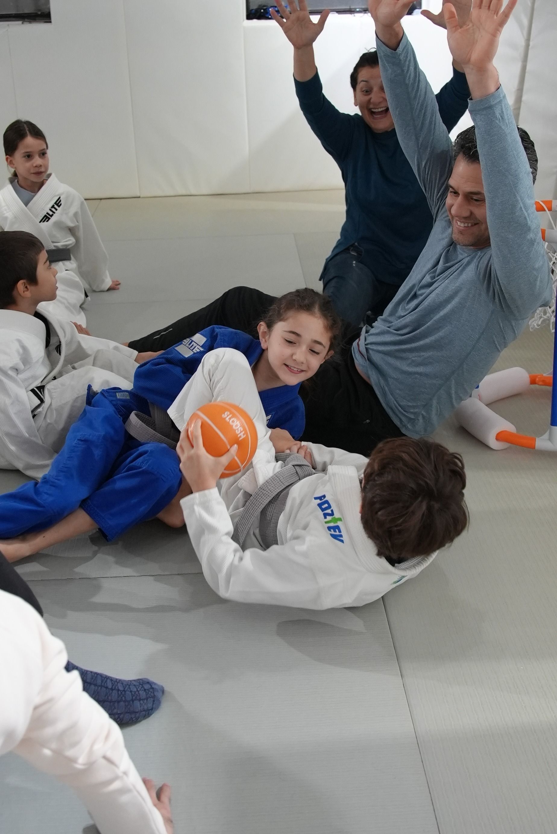 Kids practice controlled grappling drills at Range Brazilian Jiu-Jitsu NYC in New York.