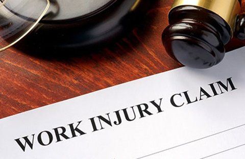 An image of items representing a work injury attorney serving Kenosha, WI