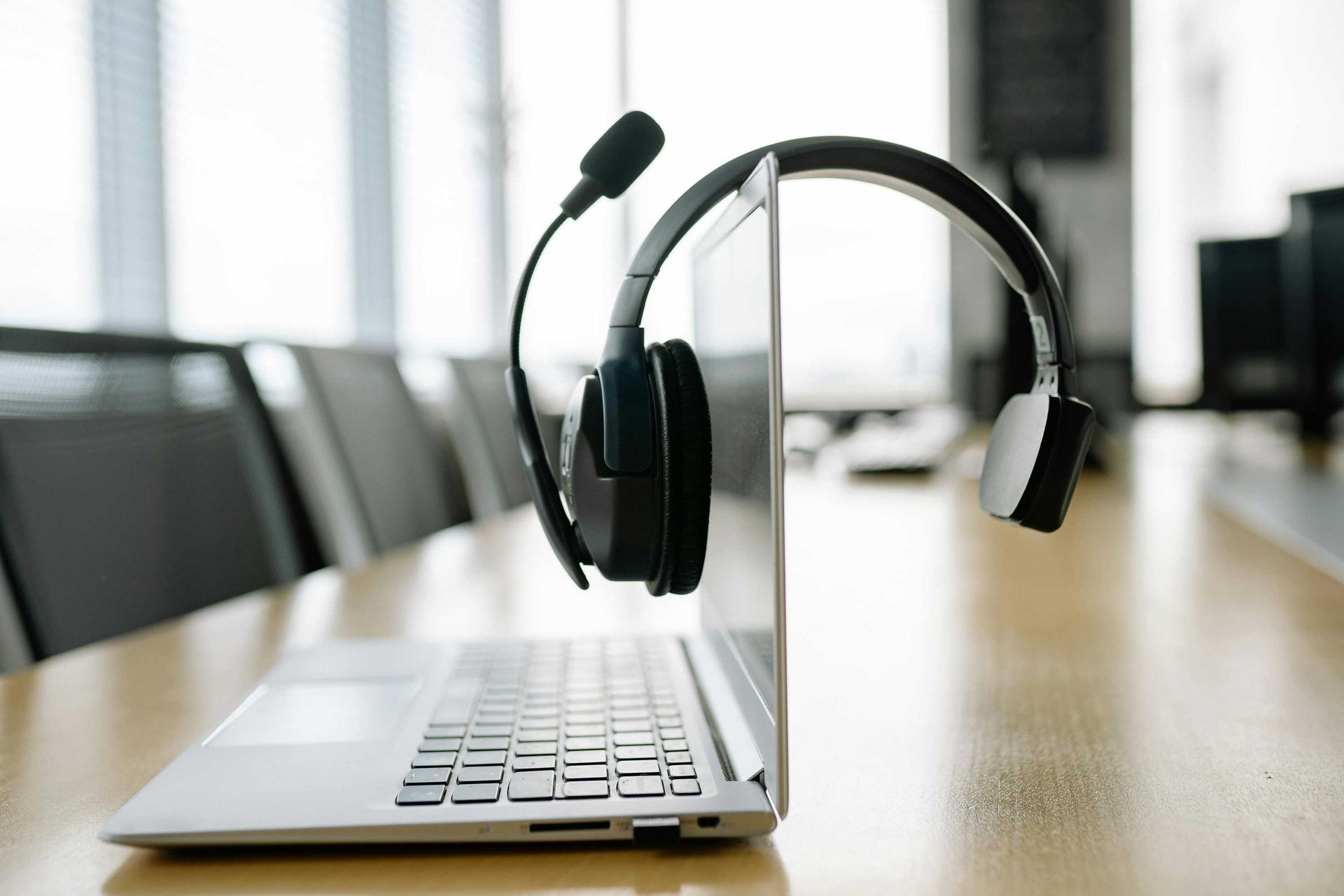 A Pair of Headphones Sitting on Top of a Laptop Computer — Complete Computing Consultancy In Maryborough, QLD