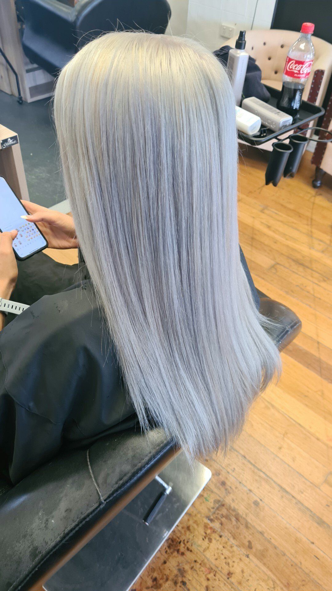 A woman with long white hair.