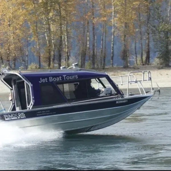 A boat with the word jet boat tours on it