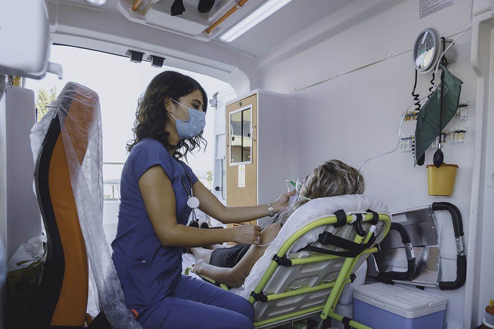 A Nurse Treating The Patient — Bristol, TN — Ambulance Service of Bristol, Inc.