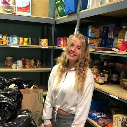 woman at food pantry