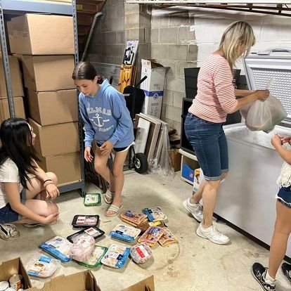 people packing boxes