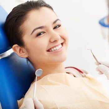 Woman smiling with perfect teeth — Dental Services in Virginia Beach, VA