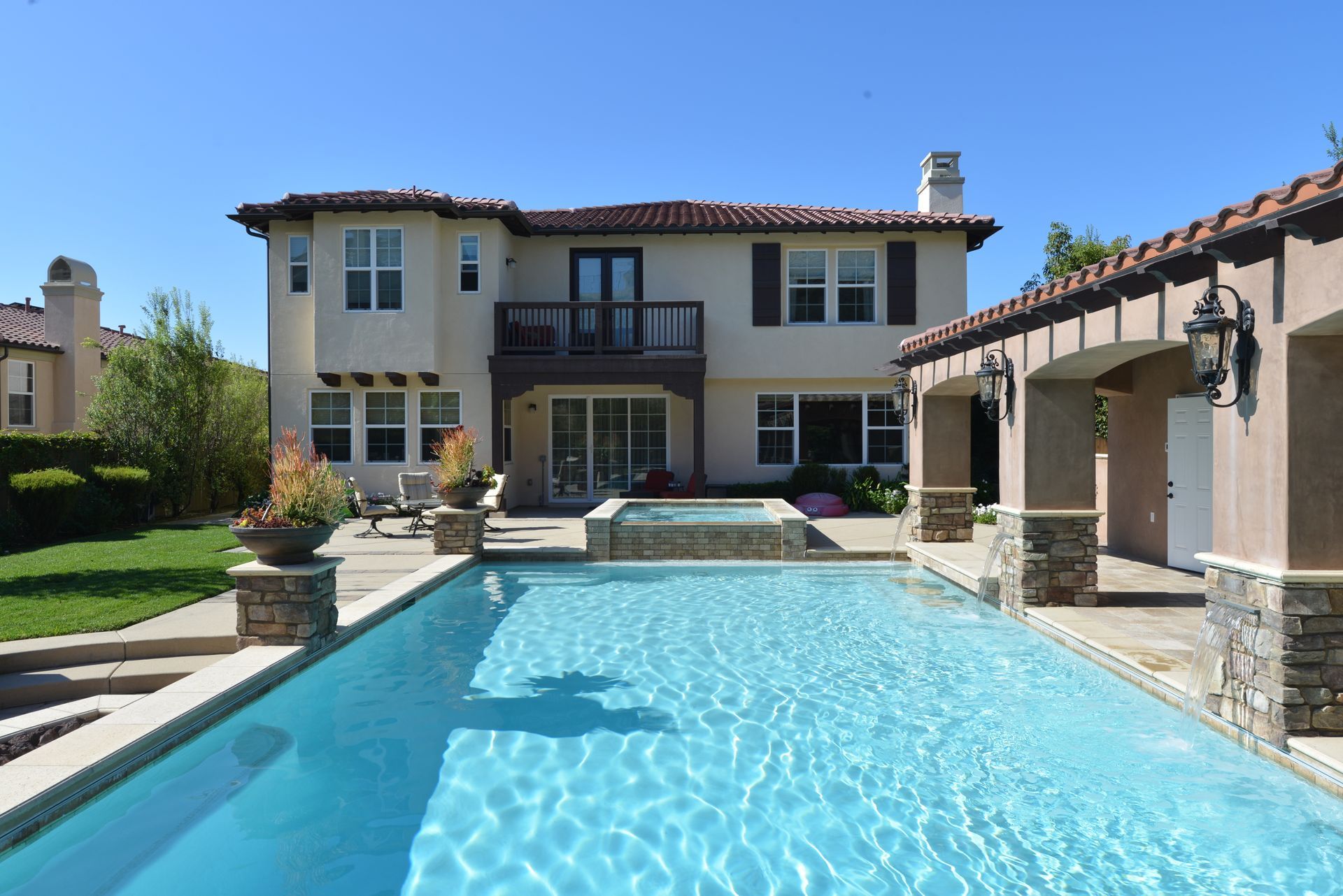 custom design-build renovated backyard with stone pool