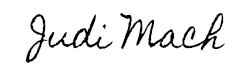 A handwritten signature of judi mack on a white background.
