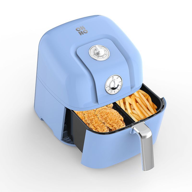A light blue air fryer with an open drawer containing fried chicken tenders and french fries, isolated on white.