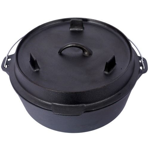 A black cast iron Dutch oven with a lipped lid for holding hot coals and a wire handle, set against a white background.