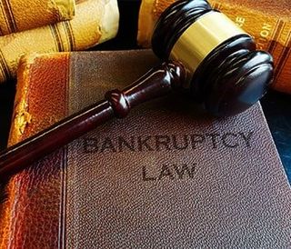 Gavel on bankruptcy Law books — Bankruptcy in Walkersville, MD