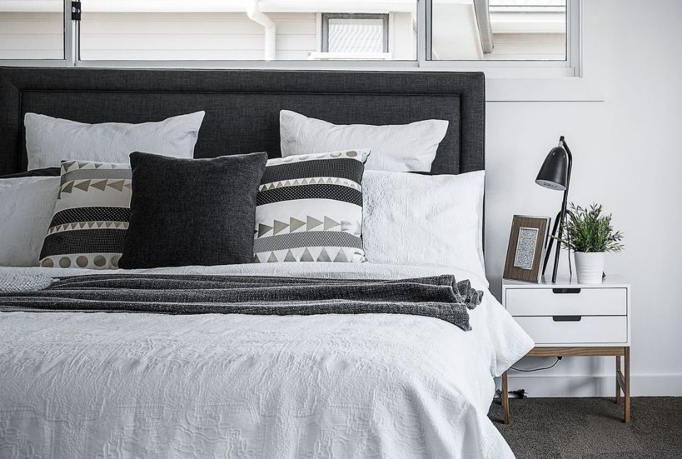 cushion lying on bed