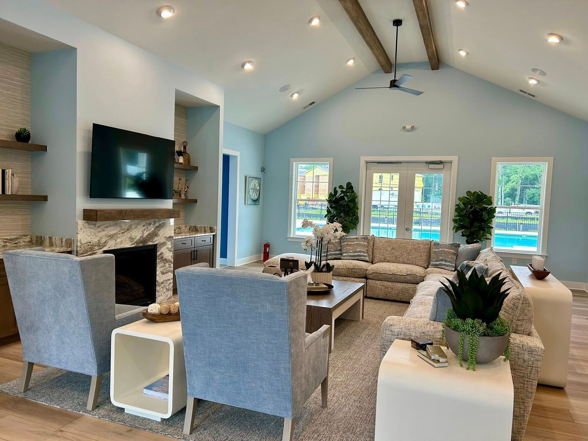 A living room filled with furniture and a flat screen tv.