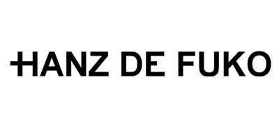 "Hanz de Fuko" text logo with a cross symbol on the "H"