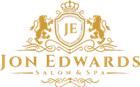 Jon Edwards Salon & Spa logo: gold crest with lions, crown, and initials "JE".